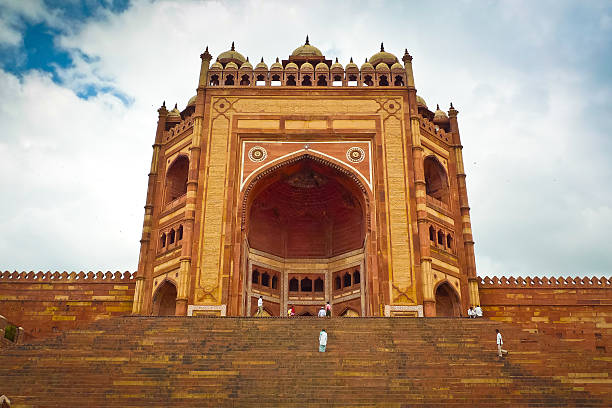 Low angle view of the massive Buland Darwaza gateway made of red sandstone at Fatehpur Sikri